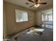 Bedroom featuring natural light from window, ceiling fan at 43213 W Cowpath Rd, Maricopa, AZ 85138