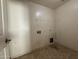 Spacious laundry room offers convenience for cleaning and laundry tasks at 43213 W Cowpath Rd, Maricopa, AZ 85138