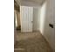 A view of the laundry room from the doorway at 43213 W Cowpath Rd, Maricopa, AZ 85138