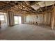 Interior framing for a new home showing insulation, open floor plan, and sliding glass door at 47450 W Kenner Dr, Maricopa, AZ 85139