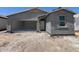 New construction features a modern exterior, two-car garage and stucco finish in a sunny neighborhood at 47706 W Moeller Rd, Maricopa, AZ 85139