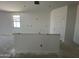 Spacious kitchen area featuring a large island, offering ample space and open design at 47706 W Moeller Rd, Maricopa, AZ 85139