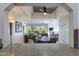 Inviting living room with golf course views, a cozy fireplace, and stylish decor at 6138 N 28Th St, Phoenix, AZ 85016