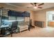 Bedroom setup with loft bed, wooden dresser, a desk and chair. This is a great setup for any student at 7169 S Dodane Ct, Gilbert, AZ 85298
