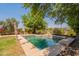 Backyard pool with a relaxing lounge area, perfect for outdoor enjoyment at 7169 S Dodane Ct, Gilbert, AZ 85298