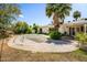 View of the backyard featuring a pool, mature landscaping, and an outdoor patio at 7424 E Cambridge Ave, Scottsdale, AZ 85257