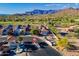 Fairway Views community featuring lush landscaping, mountain views, and a grand gated entrance at 8950 E Greenview Dr, Gold Canyon, AZ 85118