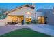 Desert property featuring a covered patio, backyard BBQ, and manicured yard with a brick paver patio at 8950 E Greenview Dr, Gold Canyon, AZ 85118