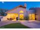 Desert property featuring a covered patio, backyard BBQ, and manicured yard with a brick paver patio at 8950 E Greenview Dr, Gold Canyon, AZ 85118