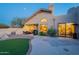Desert property featuring a covered patio, backyard BBQ, and manicured yard with a brick paver patio at 8950 E Greenview Dr, Gold Canyon, AZ 85118