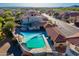Community pool with ample space for enjoying the weather and landscaping at 8950 E Greenview Dr, Gold Canyon, AZ 85118