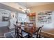 Spacious dining room with hardwood floors, decorative lighting and buffet at 8950 E Greenview Dr, Gold Canyon, AZ 85118