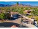 Desert home featuring a tile roof, two-car garage, and mountain views at 8950 E Greenview Dr, Gold Canyon, AZ 85118