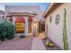 Charming front entrance with cacti, decorative metal, and a concrete walkway at 8950 E Greenview Dr, Gold Canyon, AZ 85118