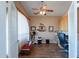 Office with wood floors, a ceiling fan, and natural lighting at 8950 E Greenview Dr, Gold Canyon, AZ 85118