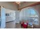 Office featuring wood floors, a ceiling fan, and view of a golf course at 8950 E Greenview Dr, Gold Canyon, AZ 85118