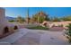 Desert property patio featuring desert landscape, an outdoor kitchen and brick pavers at 8950 E Greenview Dr, Gold Canyon, AZ 85118