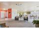 Open concept living room leading to the kitchen and entry at 9175 E Rainier Dr, Gold Canyon, AZ 85118