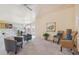 Bright and airy living room with plush carpeting, comfortable seating, and neutral walls create a relaxing atmosphere at 9175 E Rainier Dr, Gold Canyon, AZ 85118