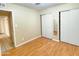 Bedroom featuring closet, and hardwood floors at 924 S Hacienda Dr # C, Tempe, AZ 85281
