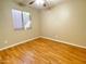 Sunlit bedroom with hardwood floors and a large window at 924 S Hacienda Dr # C, Tempe, AZ 85281