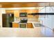 Kitchen featuring stainless steel appliances, light wood cabinets and spacious countertop at 924 S Hacienda Dr # C, Tempe, AZ 85281
