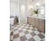 Elegant bathroom with double vanity, freestanding tub, and tiled floor at 9322 E Hidden Green Dr, Scottsdale, AZ 85262