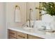 A detailed view of a bathroom sink showcasing the marble countertop and gold fixtures at 9322 E Hidden Green Dr, Scottsdale, AZ 85262