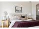 A close-up view showcases the primary bedroom's headboard, bedding, and side table decor at 9322 E Hidden Green Dr, Scottsdale, AZ 85262