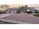 Contemporary home with desert landscaping at 9322 E Hidden Green Dr, Scottsdale, AZ 85262