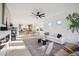 Bright, open-concept living space with an easy flow to the dining and kitchen areas at 9322 E Hidden Green Dr, Scottsdale, AZ 85262