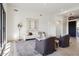 Bright living room with stylish furniture, light wood floors, and modern decor at 9322 E Hidden Green Dr, Scottsdale, AZ 85262