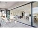 Expansive living area with seamless indoor/outdoor flow and bright, airy ambiance at 9322 E Hidden Green Dr, Scottsdale, AZ 85262