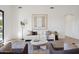 Inviting living room with neutral palette, comfortable seating, and an artistic rug at 9322 E Hidden Green Dr, Scottsdale, AZ 85262