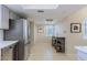 Bright kitchen with modern appliances, tile flooring, and open layout at 9745 N 95Th St # 227, Scottsdale, AZ 85258