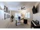 Spacious office with natural light, neutral walls, and a ceiling fan and a piano for a cozy atmosphere at 9745 N 95Th St # 227, Scottsdale, AZ 85258