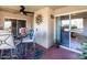 Cozy covered patio area with stylish outdoor furniture and decor at 9745 N 95Th St # 227, Scottsdale, AZ 85258