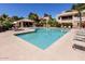 Community pool with ample lounge seating and a covered pavilion at 9745 N 95Th St # 227, Scottsdale, AZ 85258