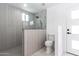 Clean and modern bathroom with a glass-enclosed shower and bright lighting at 1011 W Weldon Ave, Phoenix, AZ 85013