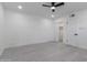 This bright bedroom has a ceiling fan and closet at 1011 W Weldon Ave, Phoenix, AZ 85013