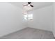 The bedroom features a modern ceiling fan, providing comfort and style at 1011 W Weldon Ave, Phoenix, AZ 85013