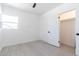 Bedroom with a closet featuring a white door and black hardware at 1011 W Weldon Ave, Phoenix, AZ 85013
