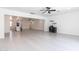 Open-concept living room with an adjacent kitchen provides ample space for relaxation and entertainment at 1011 W Weldon Ave, Phoenix, AZ 85013