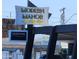 Vintage style sign for Modern Manor promoting eat, drink, and shop at 1011 W Weldon Ave, Phoenix, AZ 85013
