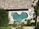 Aerial view of the backyard oasis with its pool, waterfall and well-manicured landscaping at 1092 N Roosevelt Ave, Chandler, AZ 85226