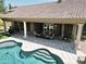 Stunning aerial view showcases the pool, covered patio, and lush landscaping of this exceptional property at 1092 N Roosevelt Ave, Chandler, AZ 85226