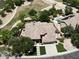 Lovely aerial view displays manicured landscaping, swimming pool, putting green and well maintained homes at 1092 N Roosevelt Ave, Chandler, AZ 85226