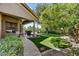 Well-manicured backyard with lush green lawn and outdoor dining area at 1092 N Roosevelt Ave, Chandler, AZ 85226