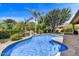 Inviting swimming pool surrounded by mature landscaping creating a private backyard oasis at 1092 N Roosevelt Ave, Chandler, AZ 85226