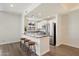 Kitchen showcasing granite counters, stainless steel appliances and a breakfast bar with seating at 11762 E Becker Ln, Scottsdale, AZ 85259
